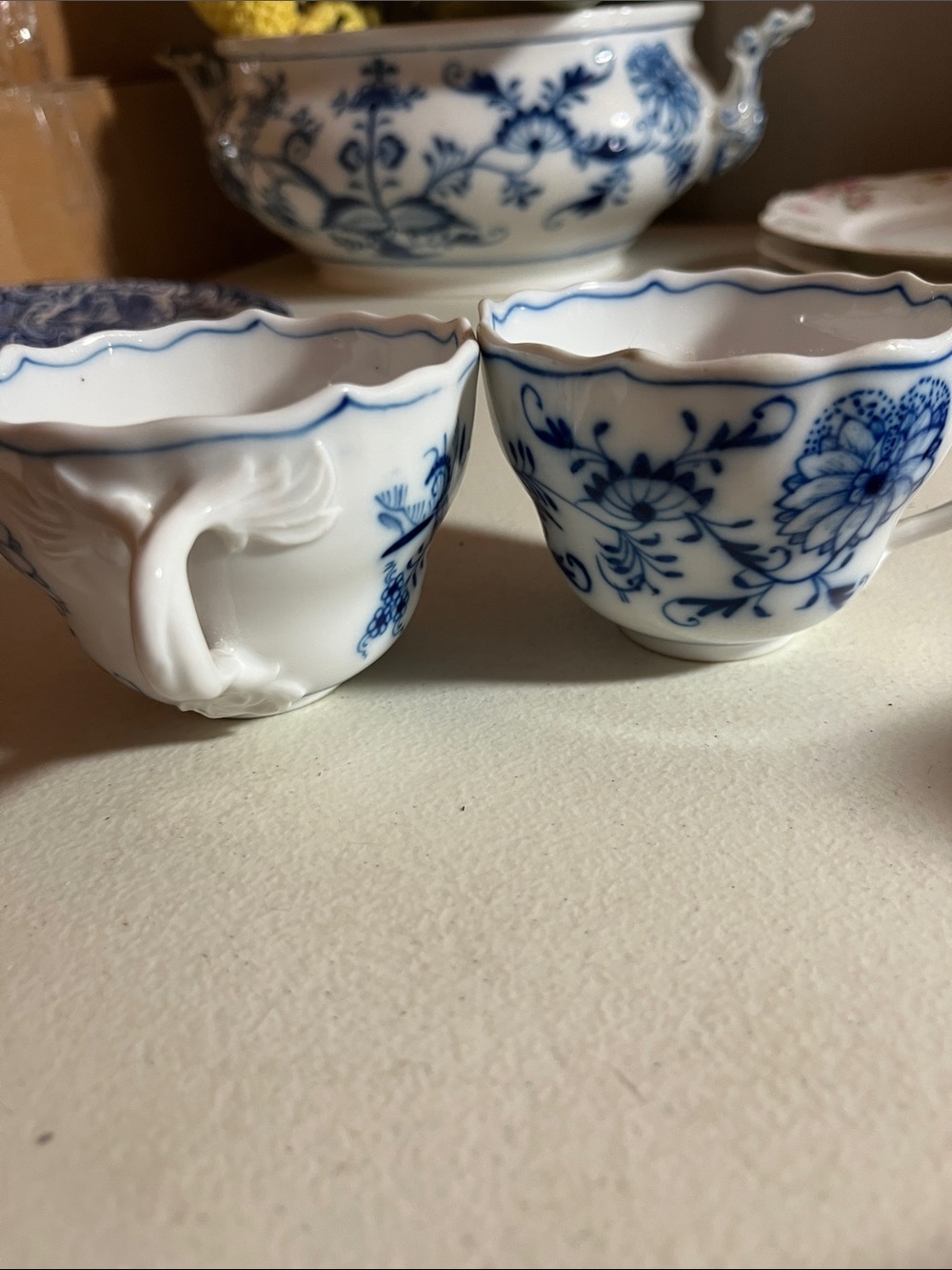Meissen White and Blue Porcelain Demitasse Cups with Floral Motif